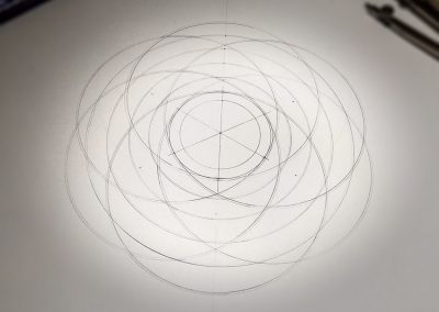Pencil outline of the geometrical framework needed to draw the design
